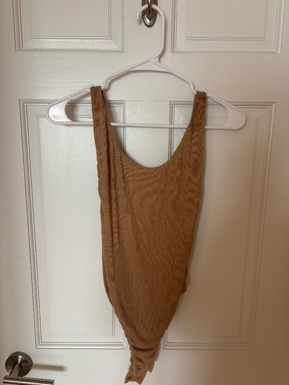 Tan bodysuit with low back